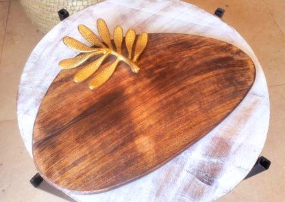 Asymmetrical platter with golden leaf